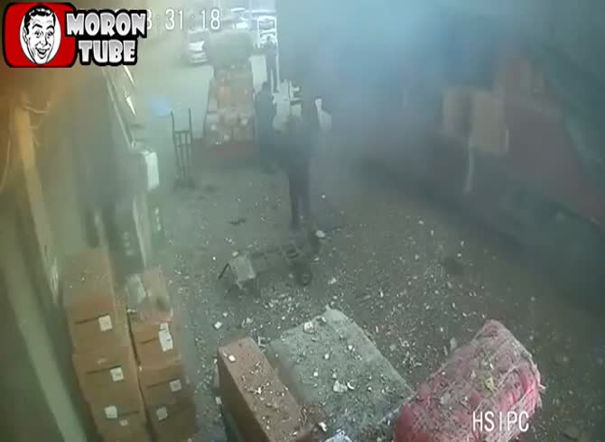 Video :An amazing explosion occurs as she drops a bag of fireworks that are too heavy for her